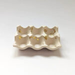 "Eggs" holder